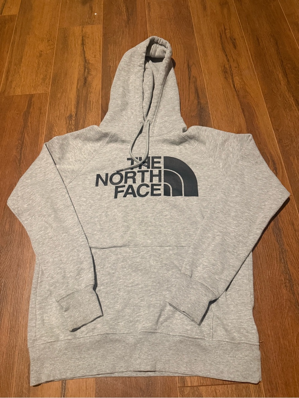 The North Face Men's Light Gray Pullover Hoodie with Black Logo